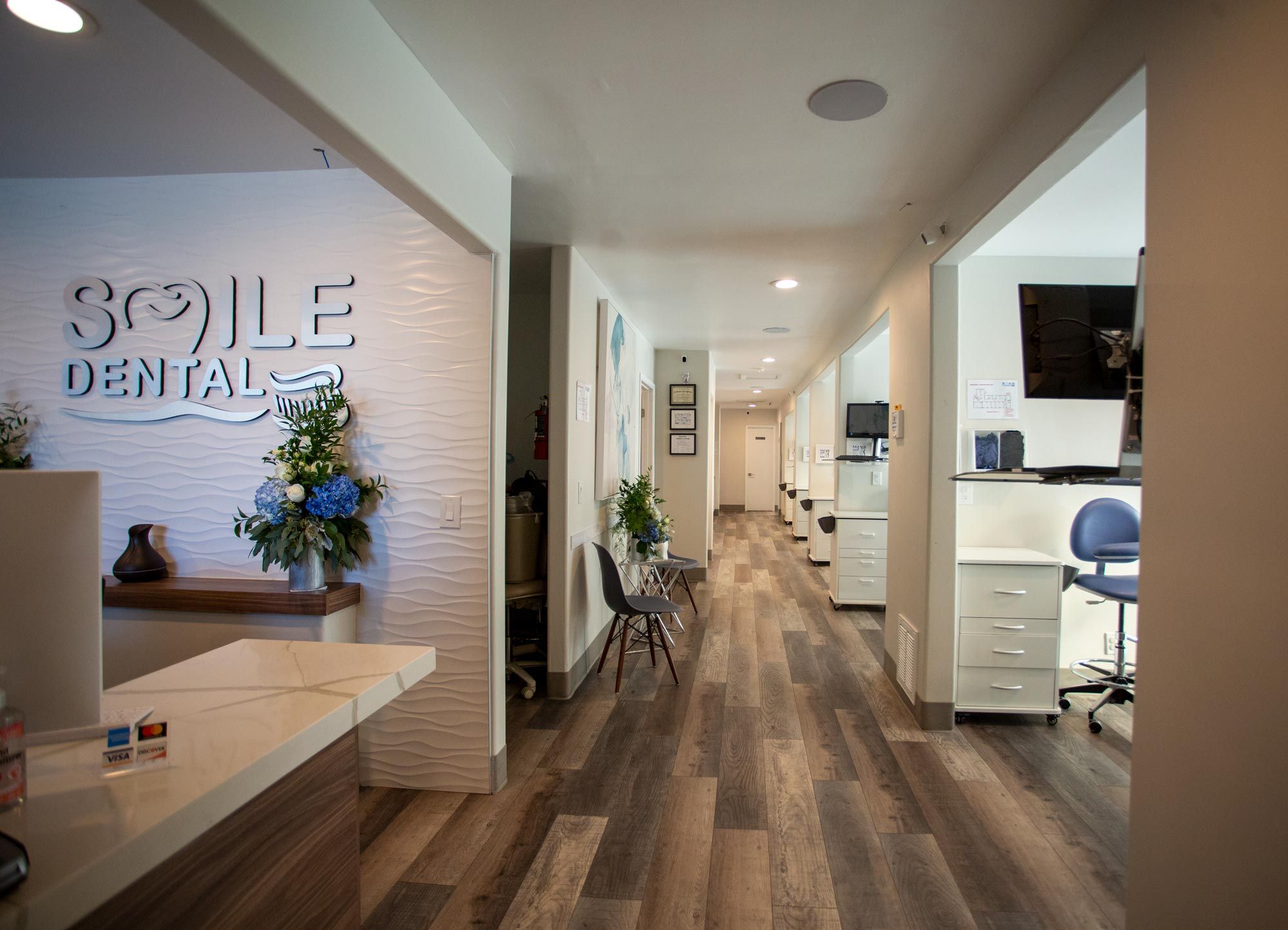 Interior hallway with the Smile Dental logo